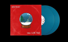 the album cover for Brad Paisley - Snow Globe Town [Aqua]