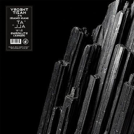 the album cover for Theory Hazit - At All ft. Iman Omari b/w At All (STLNDRMS Remix)